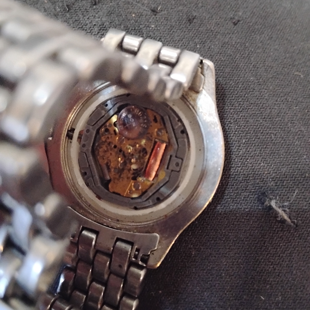 Silver Metal Watch with Exposed Mechanism